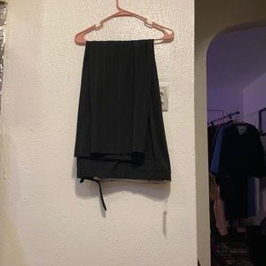 Black striped pant suit.